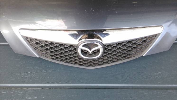 Mazda 2 - решетка,решетка радиатора