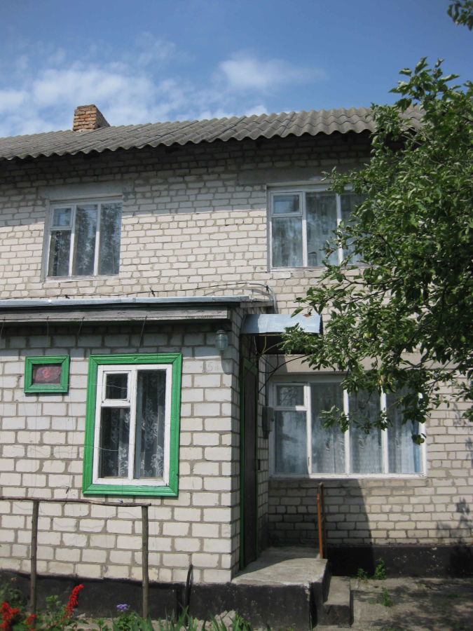 Двоповерховий будиночок в Руській Поляні