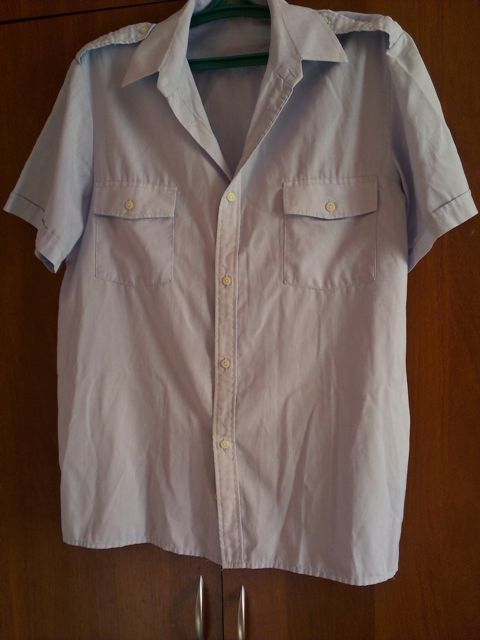 рубашка б/у 48(50)размер светло-розовая