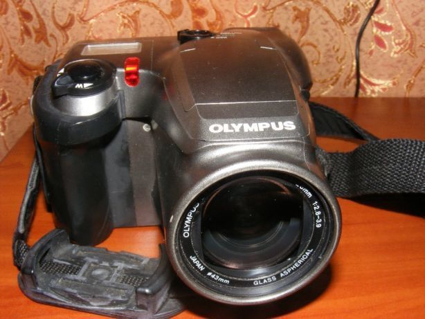 Продам ретро цифровой зеркальный фотоаппарат Olympus C-1400L б/у