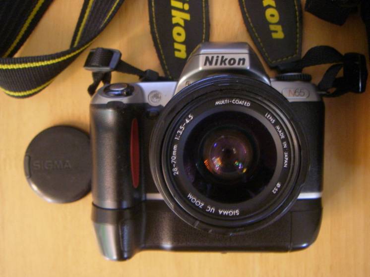 Пленочная, зеркальная, однообъективная б/у камера Nikon N65.