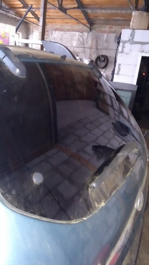 Заднее стекло крышки багажника Hyundai Tucson  2008г