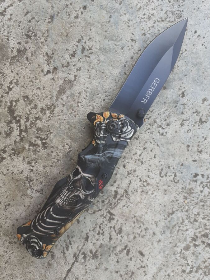 Нож складной качественный Череп с клипсой и темляком