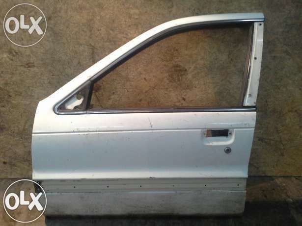 Продам 4 двери Mitsubishi Lancer 90 х годов б/у нормальное состояние