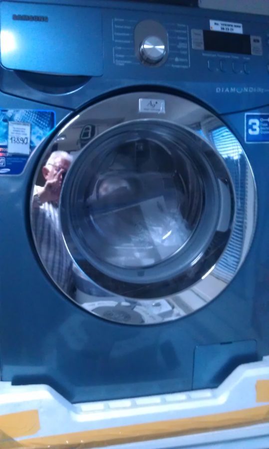Новая серебристая стиральная машина топовая Samsung WF9592GQR