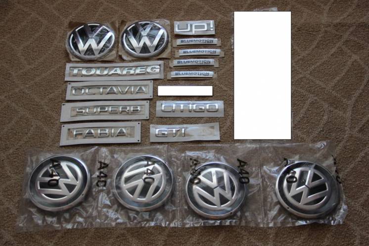 Шильдики. Логотипы Touareg, Blue Motion, Citigo, UP, VW. Эмблемы.