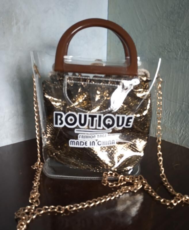 Женская прозрачная сумка boutique с мешочком золотистая модная красива