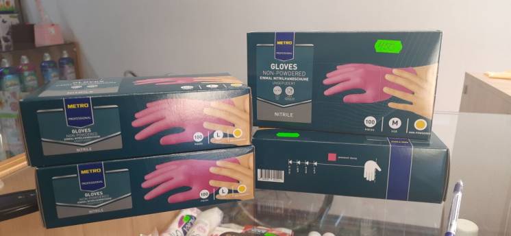 Перчатки нитриловые неопудренные розовые, размер L