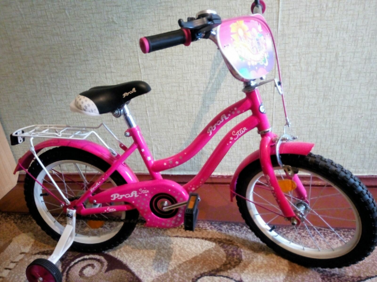Велосипед для девочки. Розовый. Колеса 16 дюймов. Состояние 5+
