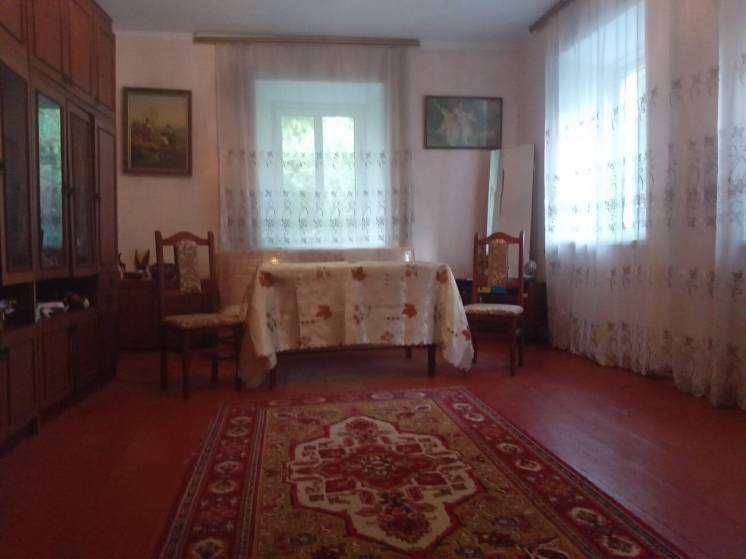 Обмін будинку на квартиру у Вінниці.