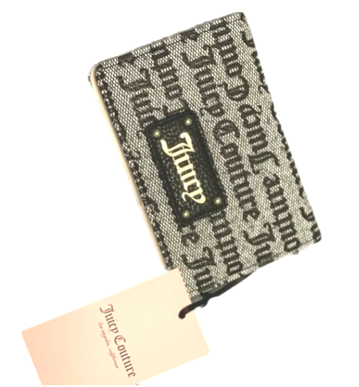 Очаровательный кошелек на молнии от Juicy Couture.