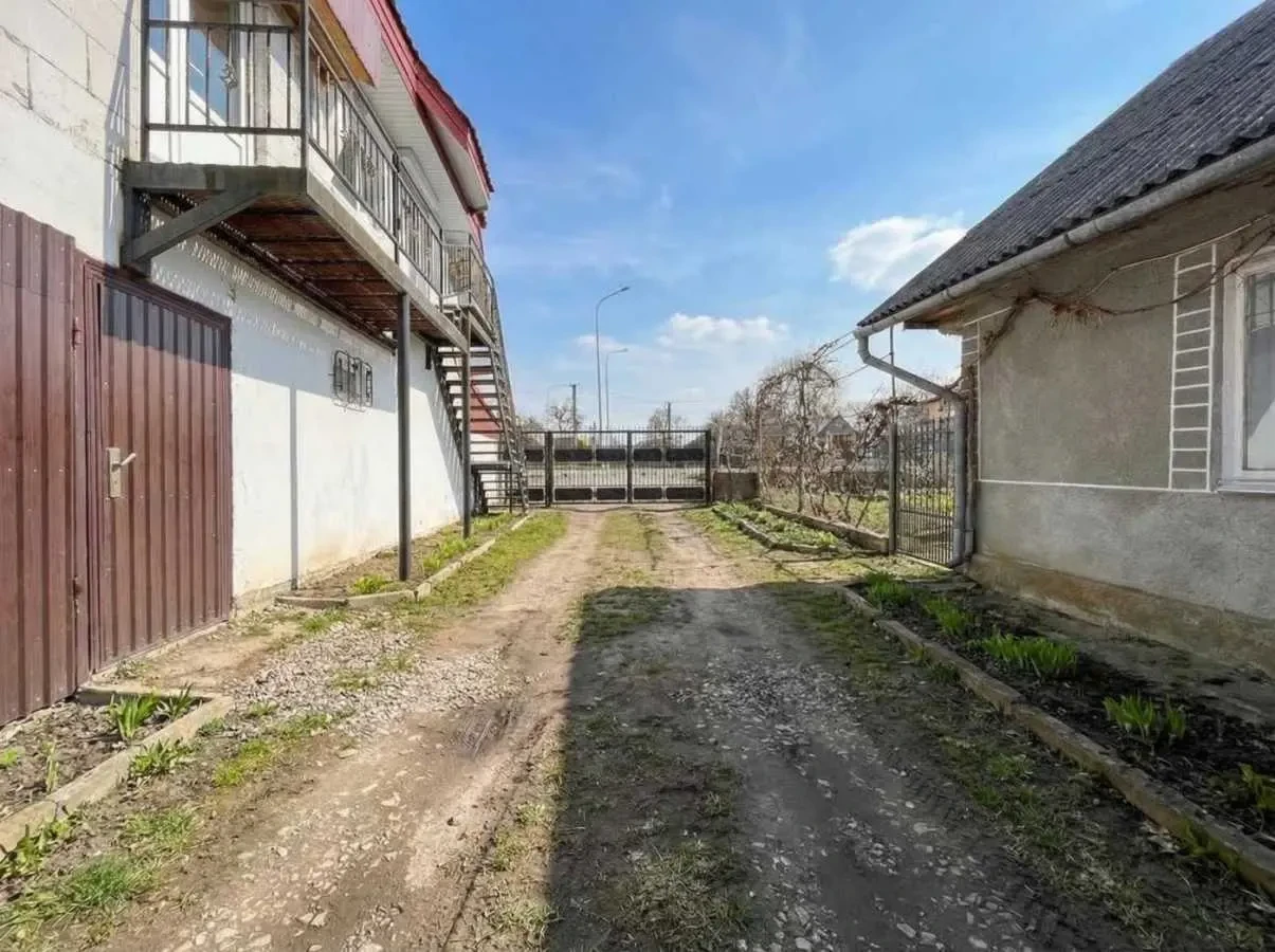 2-к будинок Пустомитівський, Щирець, Коцюбинського 6