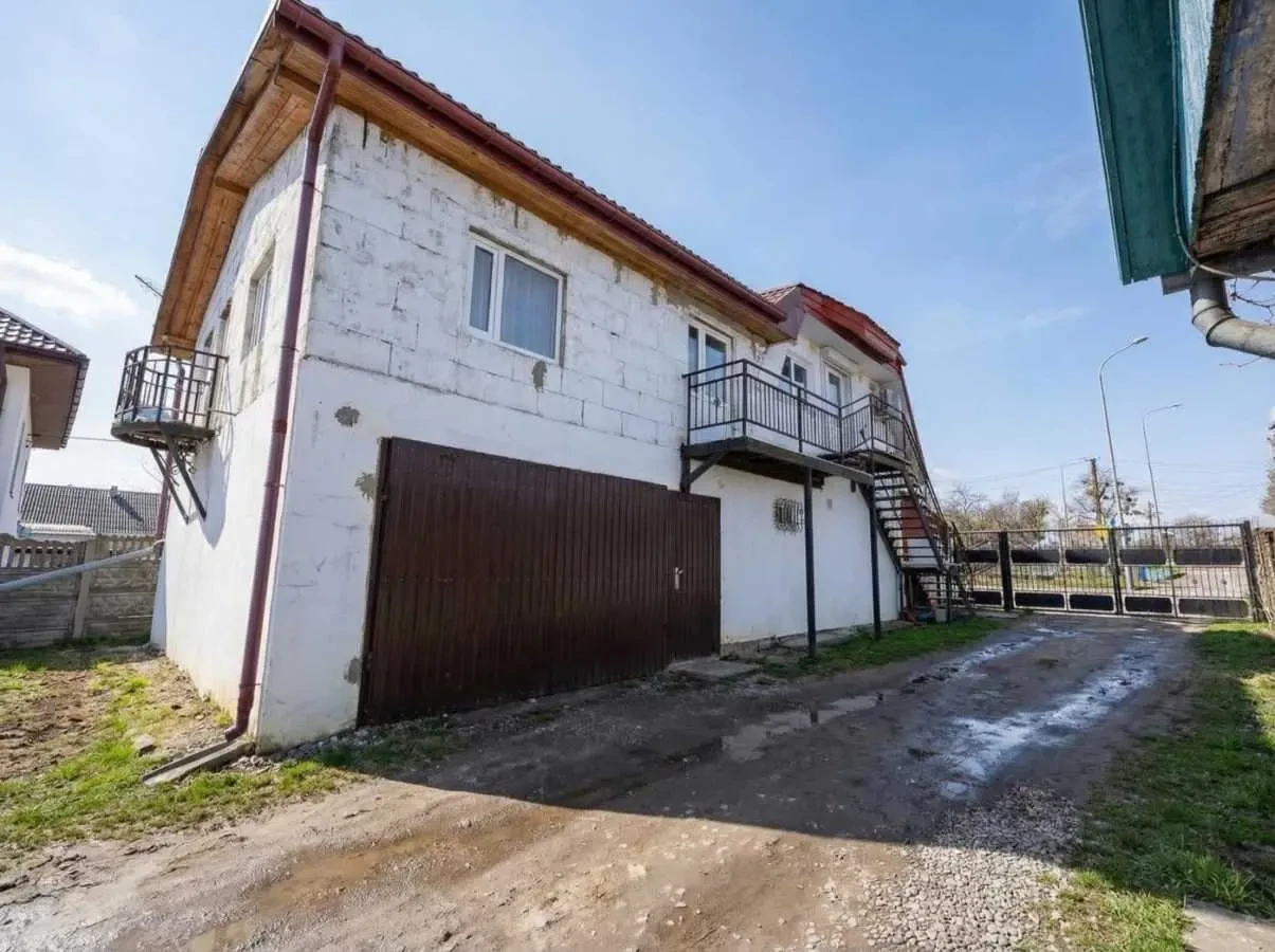 2-к будинок Пустомитівський, Щирець, Коцюбинського 14