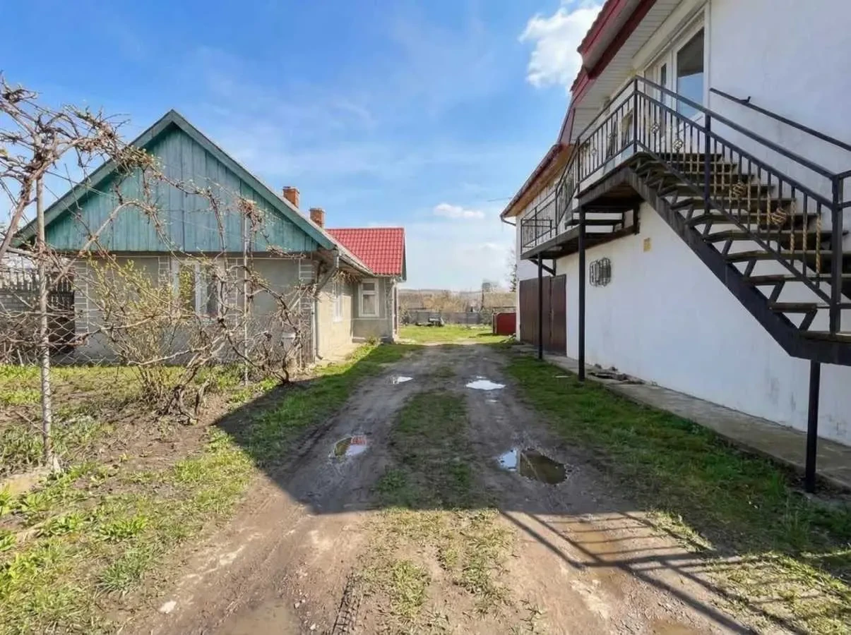 2-к будинок Пустомитівський, Щирець, Коцюбинського 11