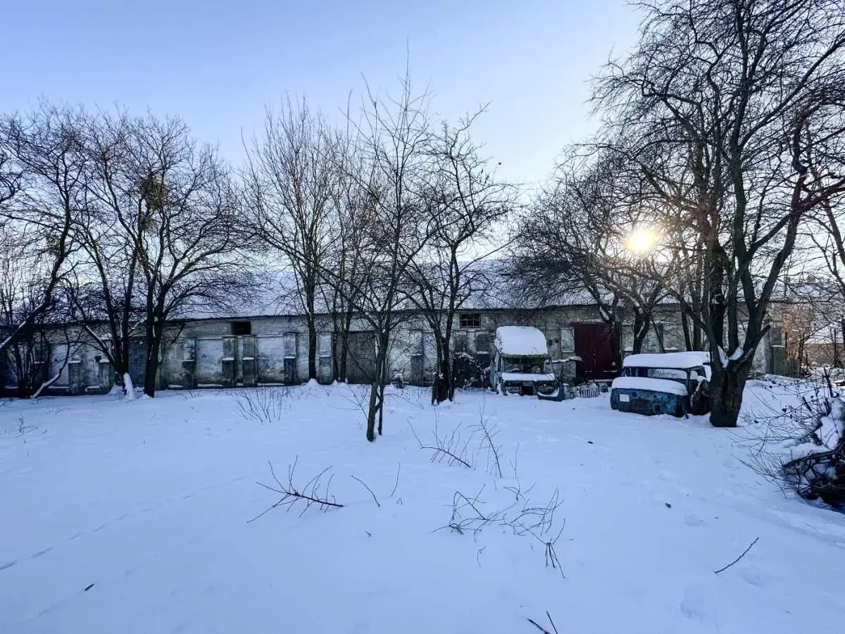 склади Пустомитівський, Підберізці, Хмельницького 7