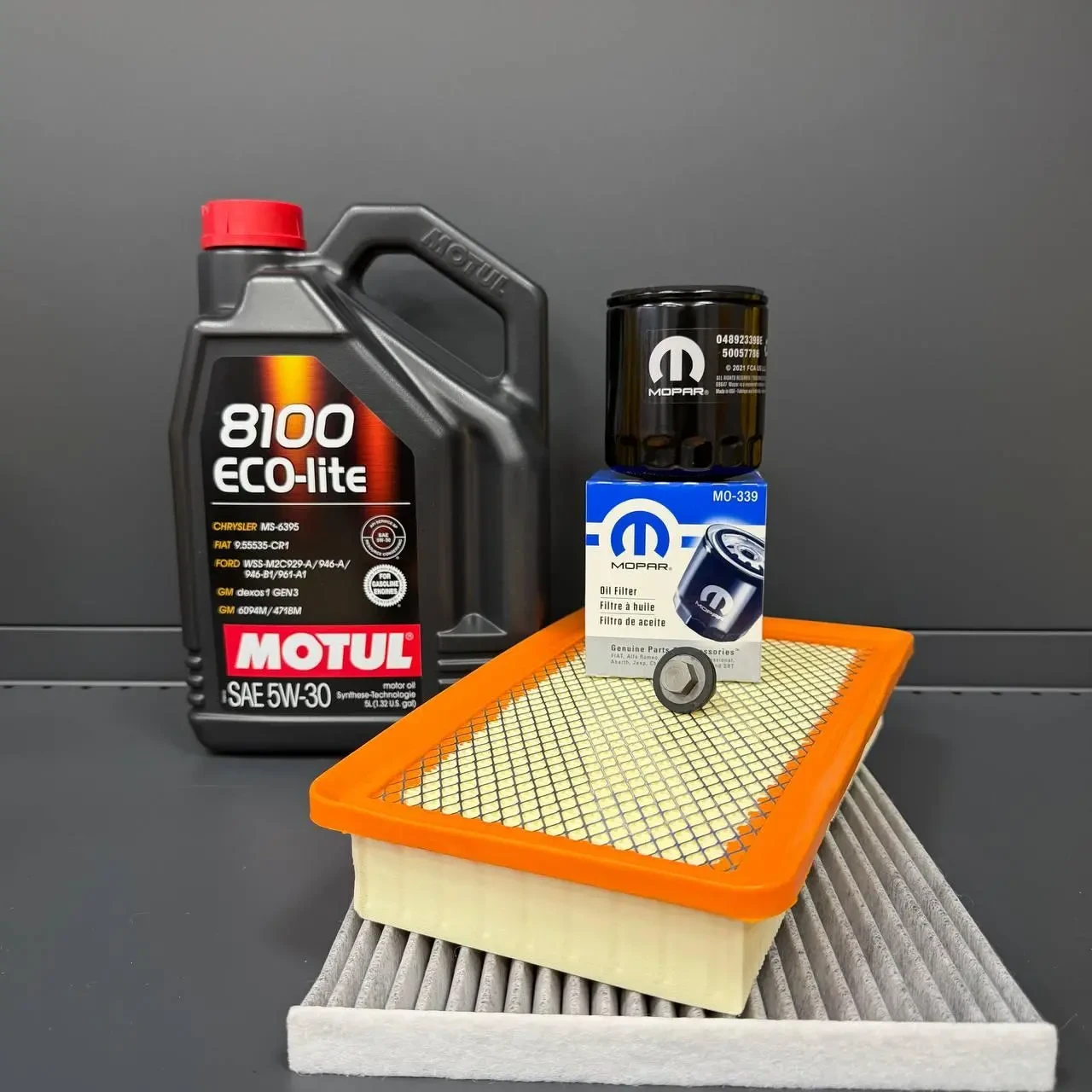 Комплект для ТО MOTUL Eco-Lite 5w30 CHRYSLER 200 2.4 (Масло, фільтр масляний, фільтр повітряний, фільтр салону вугільний, зливна