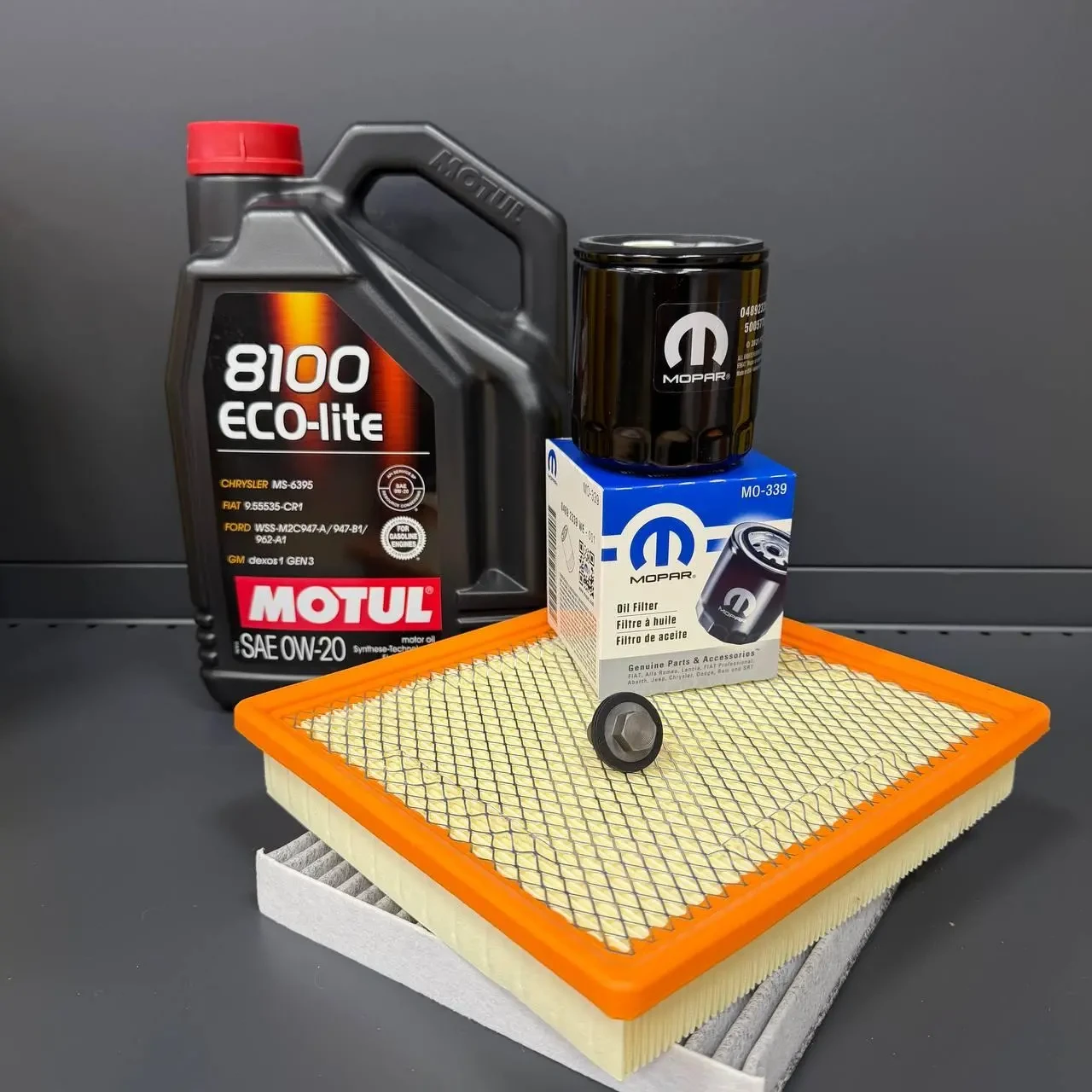 Комплект для ТО MOTUL Eco-Lite 0w20 Dodge Journey 2.4 (Масло, фільтр масляний, фільтр повітряний, фільтр салону вугільний, зливна