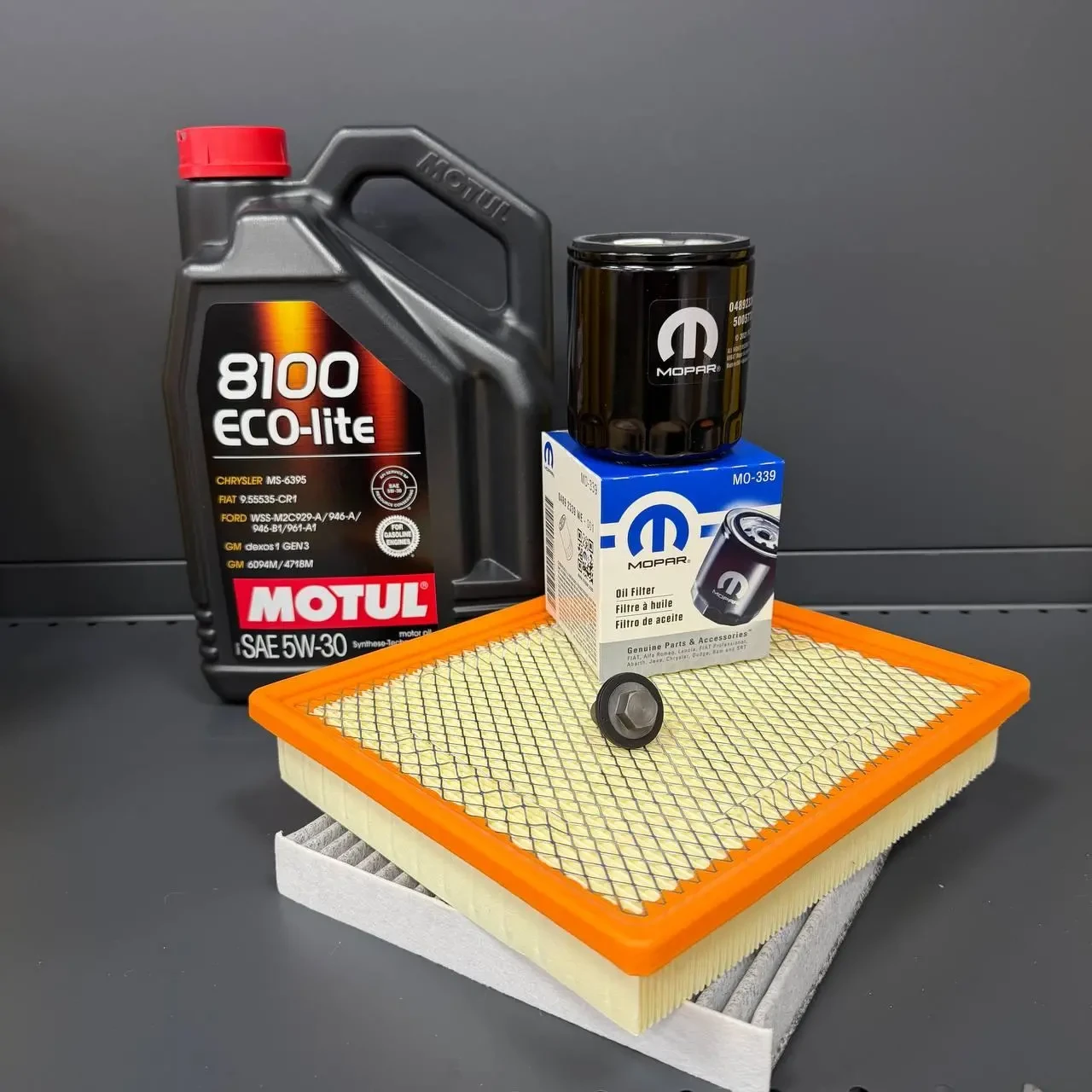 Комплект для ТО MOTUL Eco-Lite 5w30 Dodge Journey 2.4 (Масло, фільтр масляний, фільтр повітряний, фільтр салону вугільний, зливна