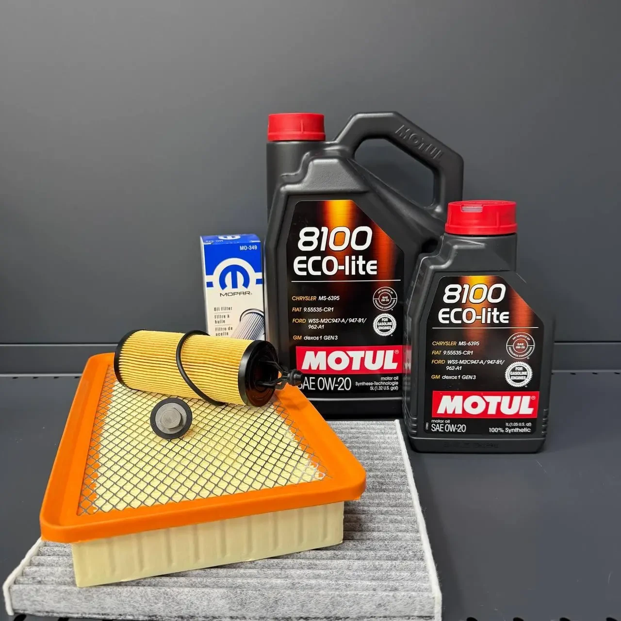 Комплект для ТО MOTUL Eco-Lite 0w20 CHRYSLER 200 3.6 (Масло, фільтр масляний, фільтр повітряний, фільтр салону вугільний, зливна