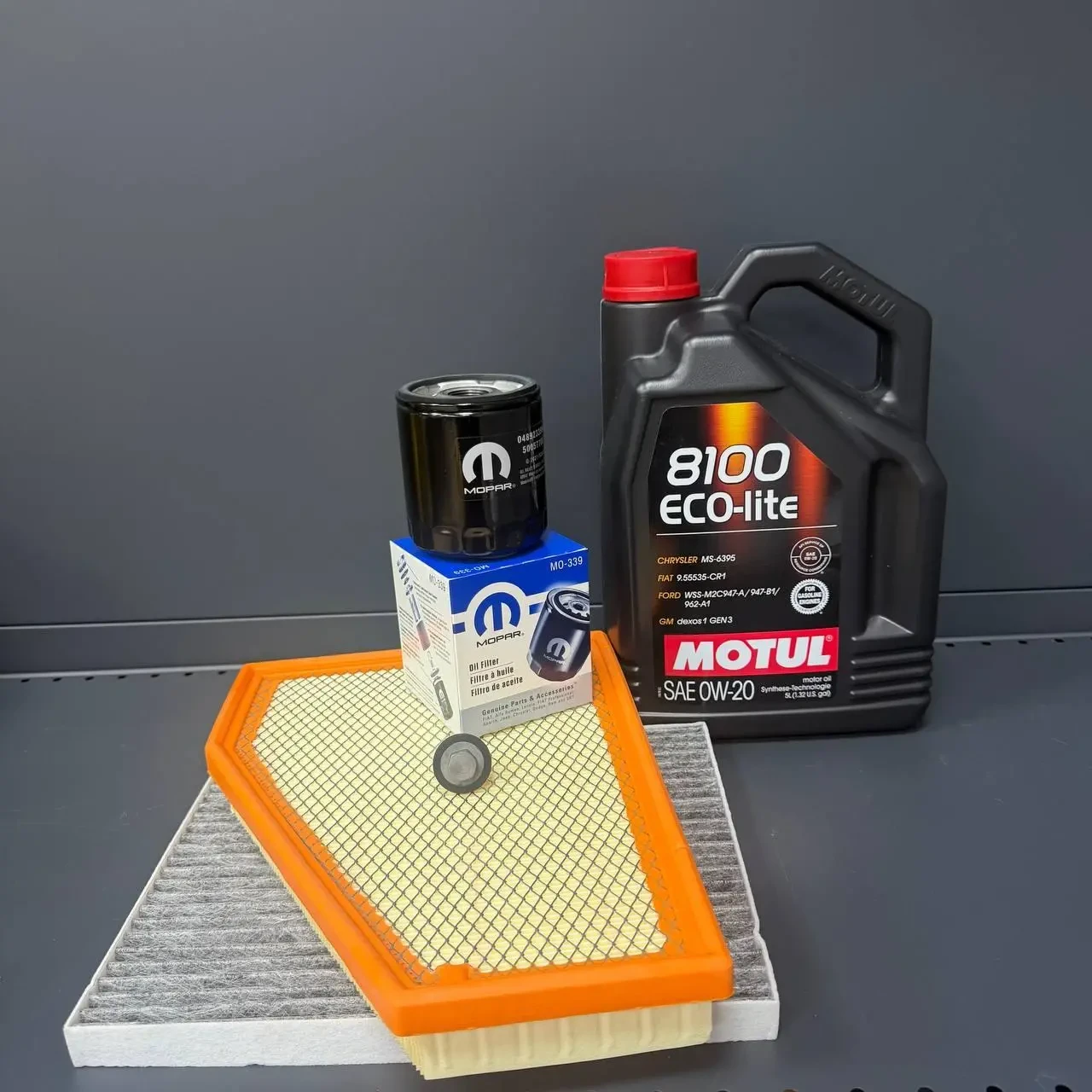 Комплект для ТО Jeep Grand Cherokee WL 2.0  Motul 0w20 (Масло, фільтр масляний, фільтр повітряний, фільтр салону вугільний, зливна