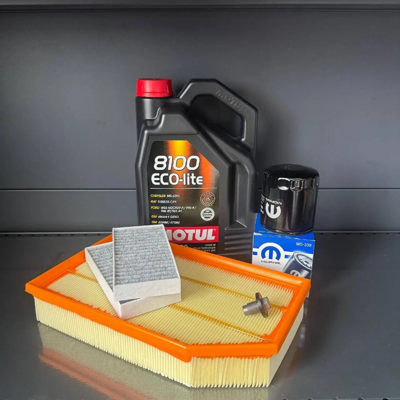 Комплект для ТО Motul 5w30 Jeep Wrangler 2.0 2018 (Масло, фільтр масляний, фільтр повітряний, фільтр салону вугільний, зливна