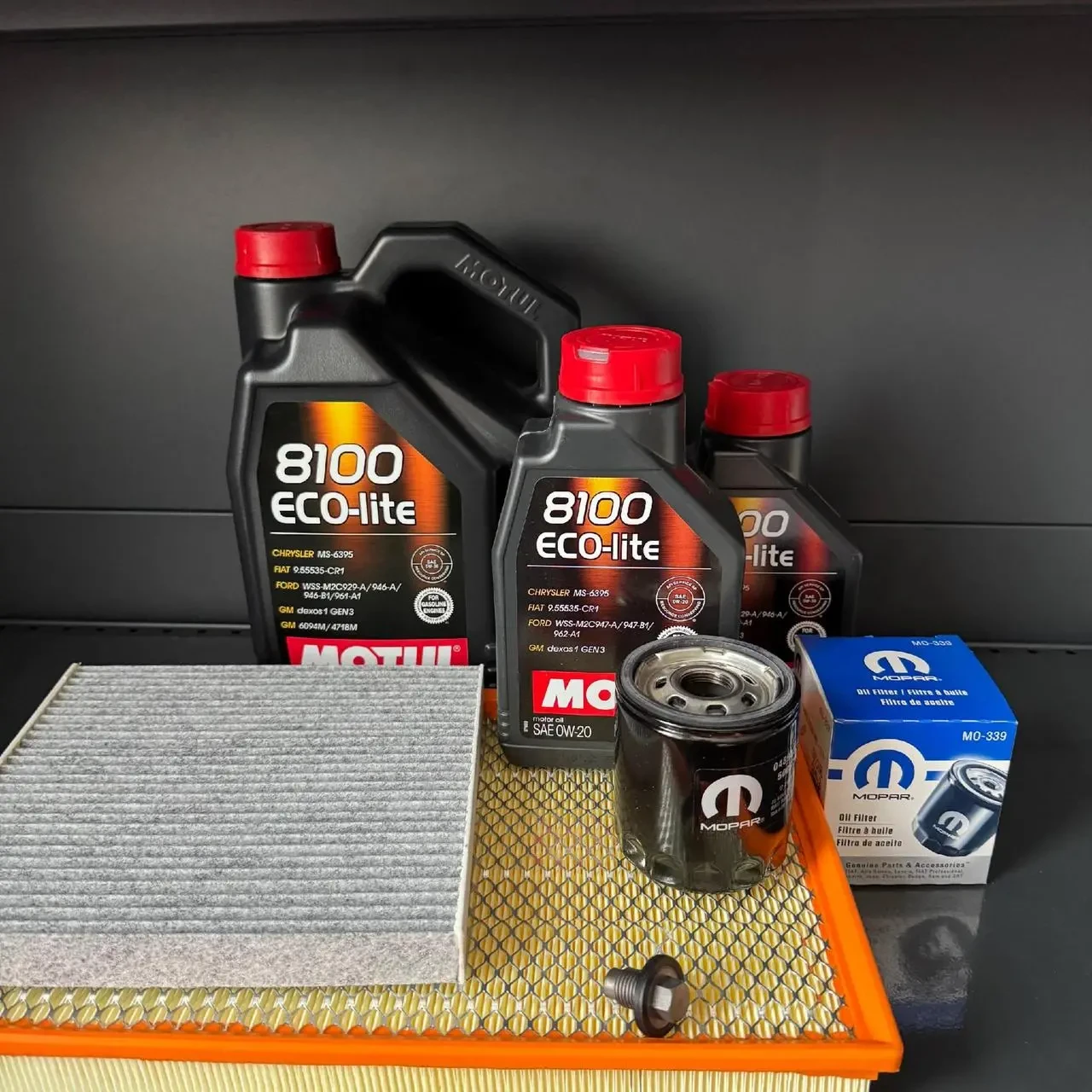 Комплект для ТО Motul 0w20 Dodge RAM 1500 5.7 13-20 (Масло5+1+1, фільтр масляний, фільтр повітряний, фільтр салону вугільний,