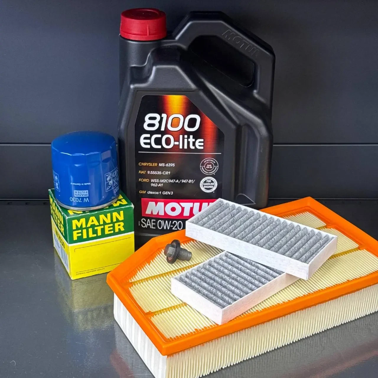 Комплект для ТО Motul 0w20 Jeep Wrangler 2.0 2018 (Масло, фільтр масляний, фільтр повітряний, фільтр салону вугільний, зливна