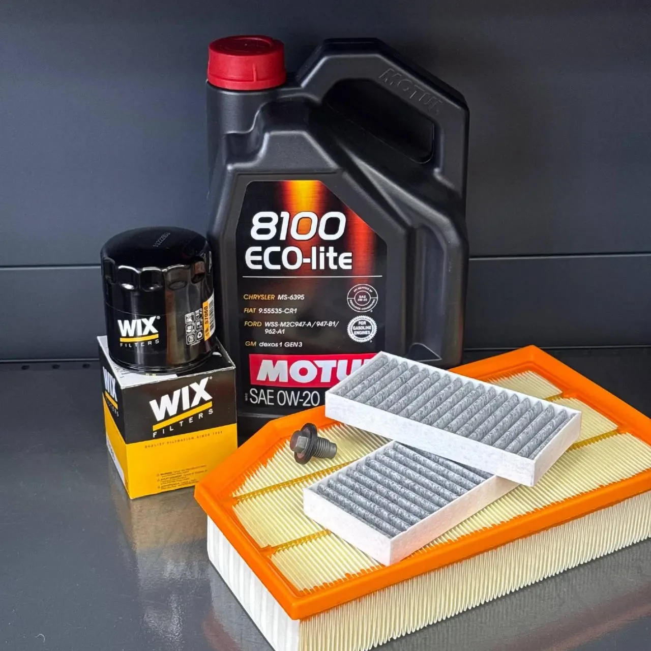 Комплект для ТО Motul 0w20 Jeep Wrangler 2.0 2018 (Масло, фільтр масляний, фільтр повітряний, фільтр салону вугільний, зливна