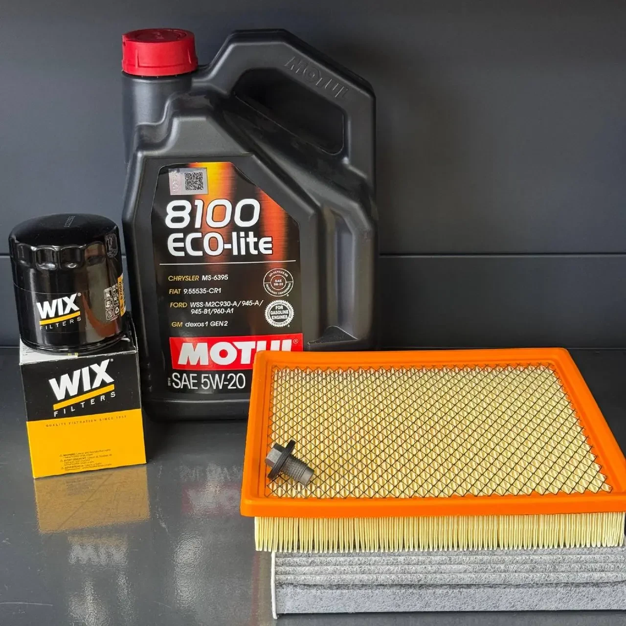 Комплект для ТО Motul 5w20 Dodge Journey 2.4 (Масло, фільтр масляний, фільтр повітряний, фільтр салону вугільний, зливна кришка)