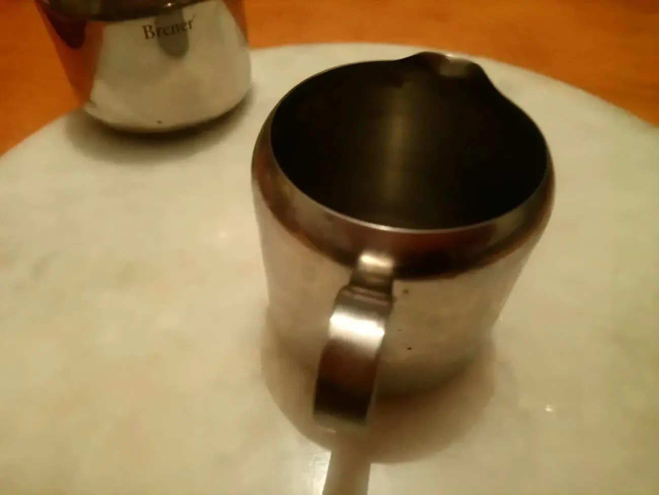 Изящный молочник из нержавейки. Германия. Brener. Высота 6,5 см 4