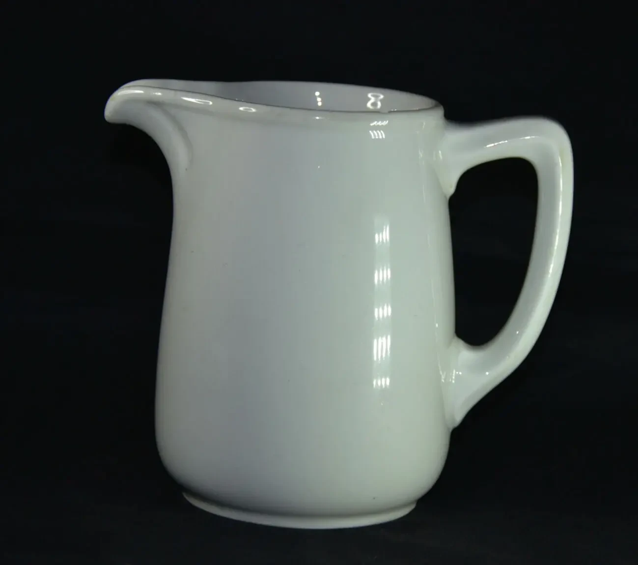 Молочник. Высота 12см Клеймо D.R.P. дойчланд рейх патент/ Скол на гор