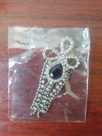 Брошка с камнями Swarovski