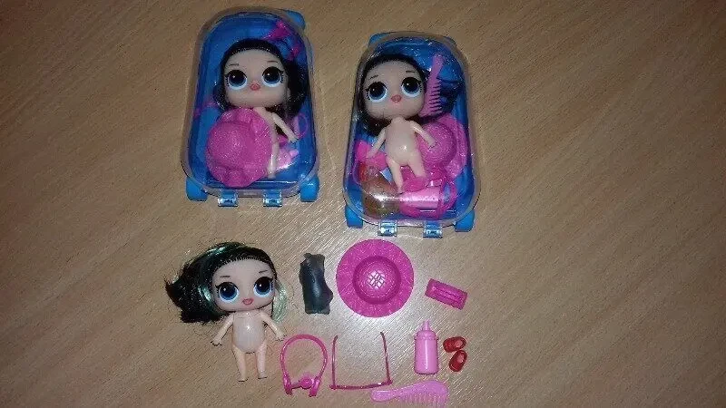 Кукла лол в Чемодане ароматизированная с аксессуарами. 3