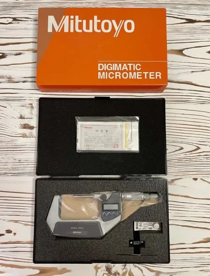 Пара мікрометрів з неповоротним мікрогвинтом