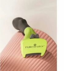 Расчёска FURminator для собак и кошек.