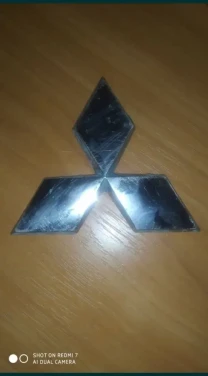 Эмблема крышки багажника Mitsubishi Lancer X 2008 оригинал