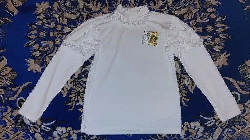 Водолазка для дівчинки .На 12-13 років