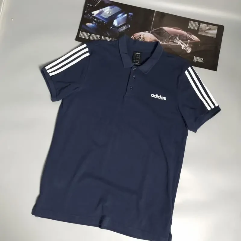 Чоловіча футболка поло adidas синя з білими лампасами 2