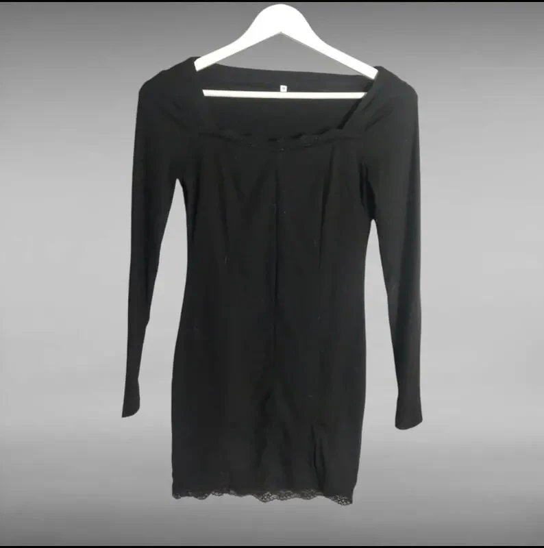 Елегантна жіноча міні-сукня з розрізом чорна 4