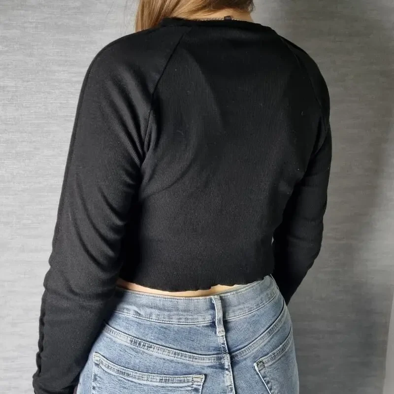 Чорний топ у рубчик з довгим рукавом 4