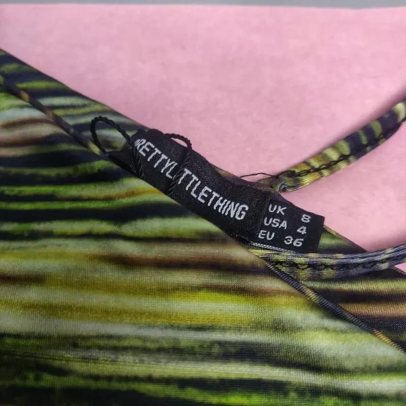 Укорочений топ з довгими рукавами та вирізами 4