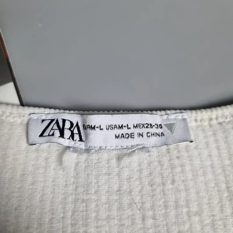 Білий кроп-топ з довгим рукавом 6