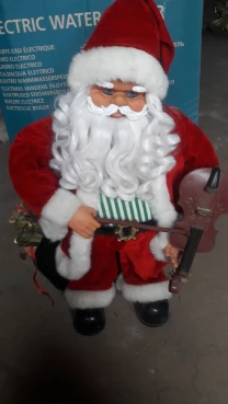 Статуетка Діда Мороза з музичним інструментом