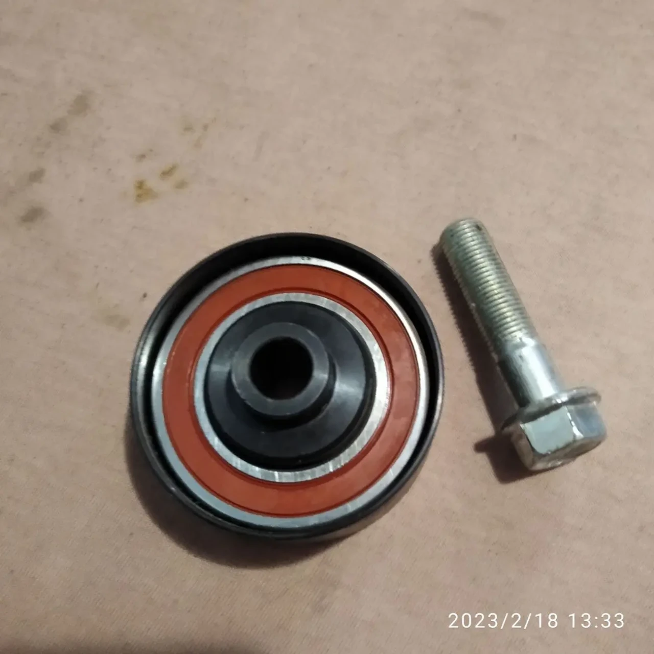 Направляющий ролик ГРМ двигателя Y17DT Опель Комбо С. 2