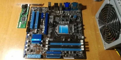 Asus P7Q57-M DO (s1156, Q57)+PCI-LAN (уценка-читать описание)