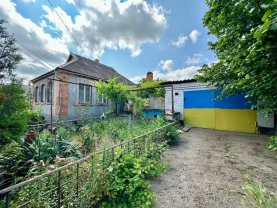 Продаж будинку з гаражем в Металургійному районі