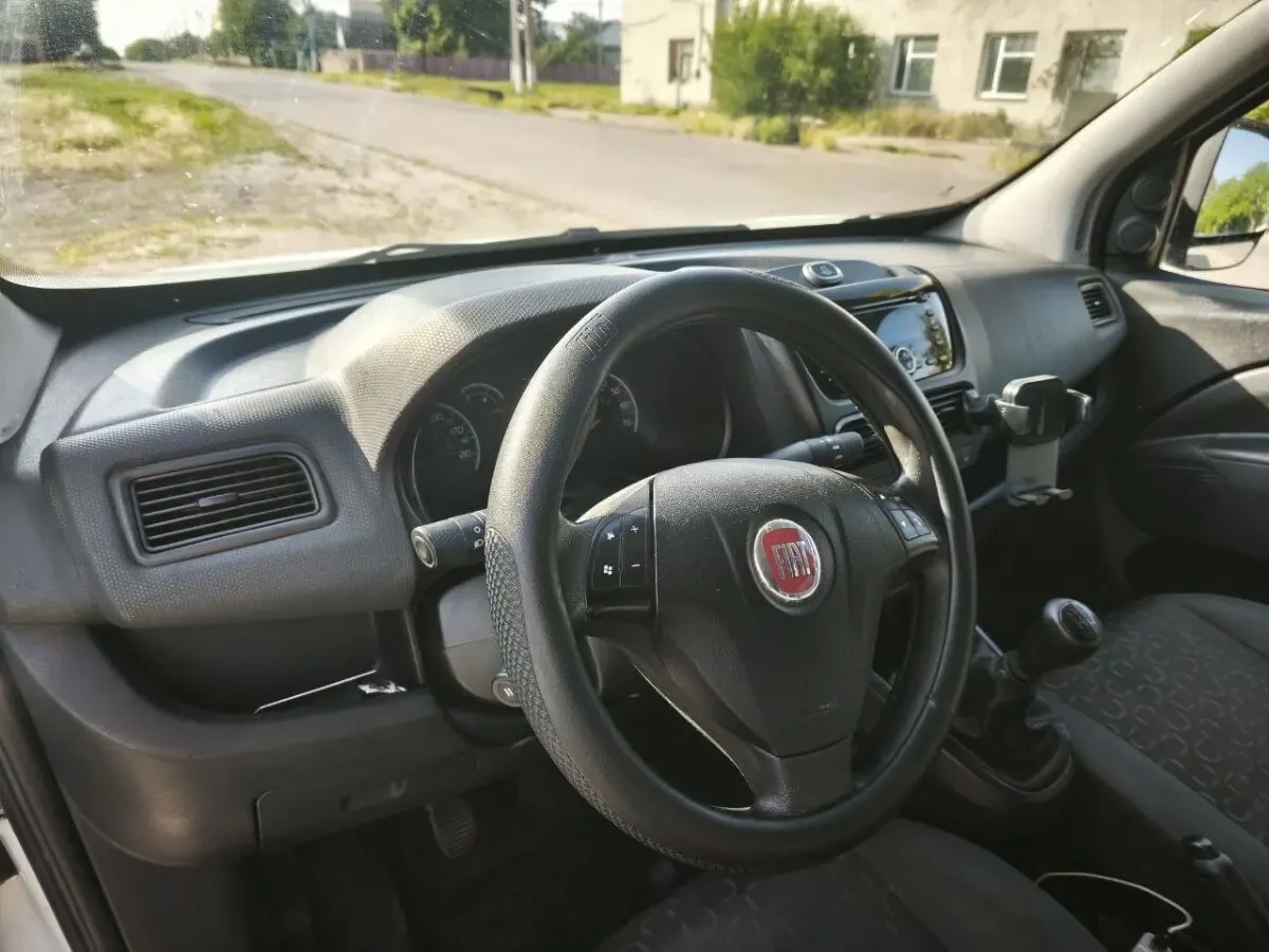 Fiat Doblo 2011 года 7