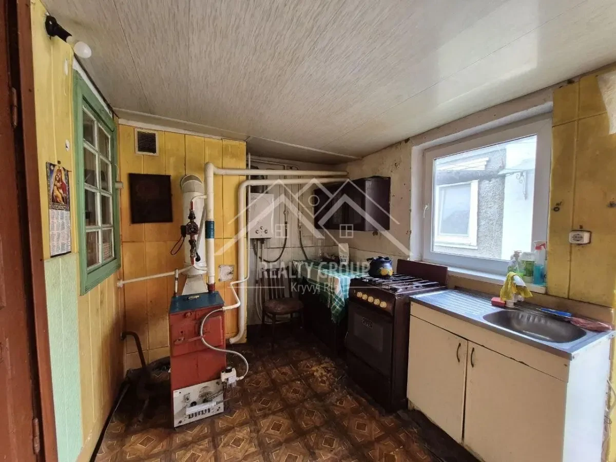 Продаж 1/2 будинку в ЦГ районі 10