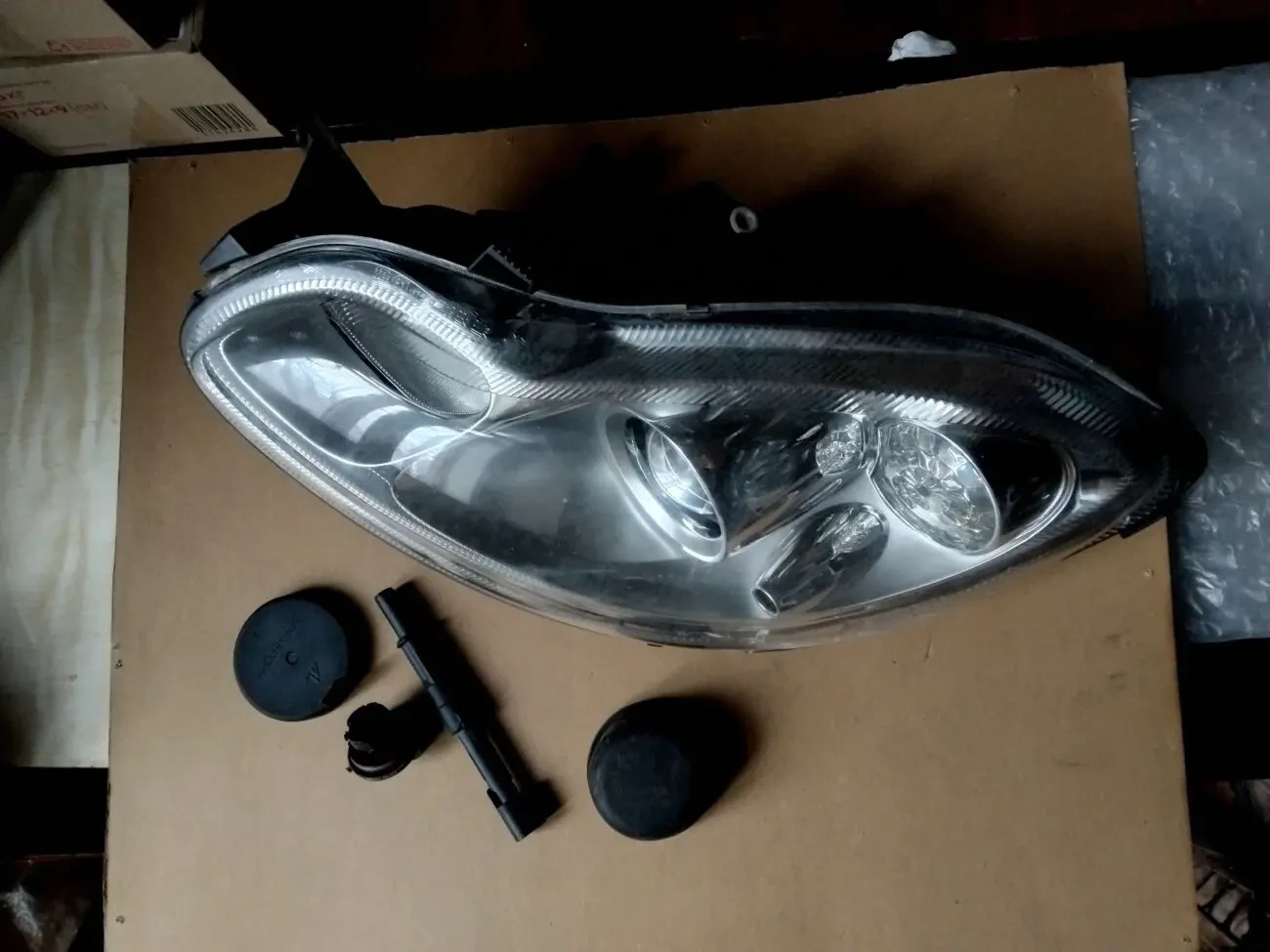 Фара ліва передня 668 (A4518200159) Smart Fortwo на запчастини