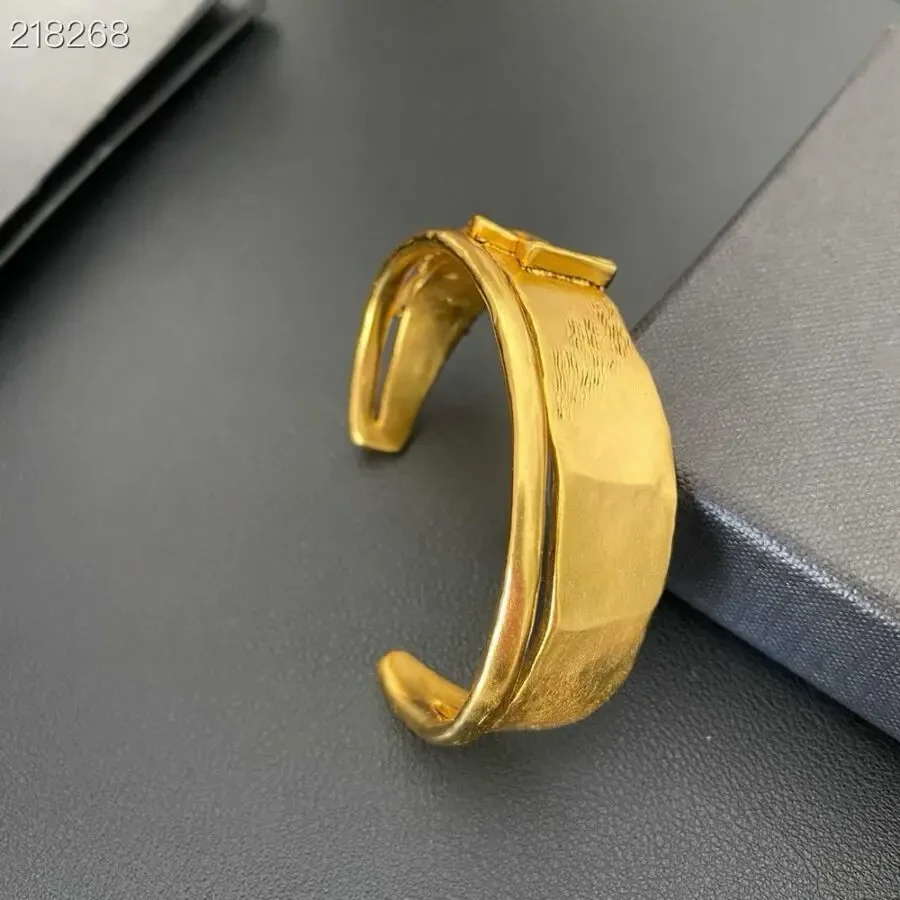 Браслет-каф Yves Saint Laurent (ysl) 2